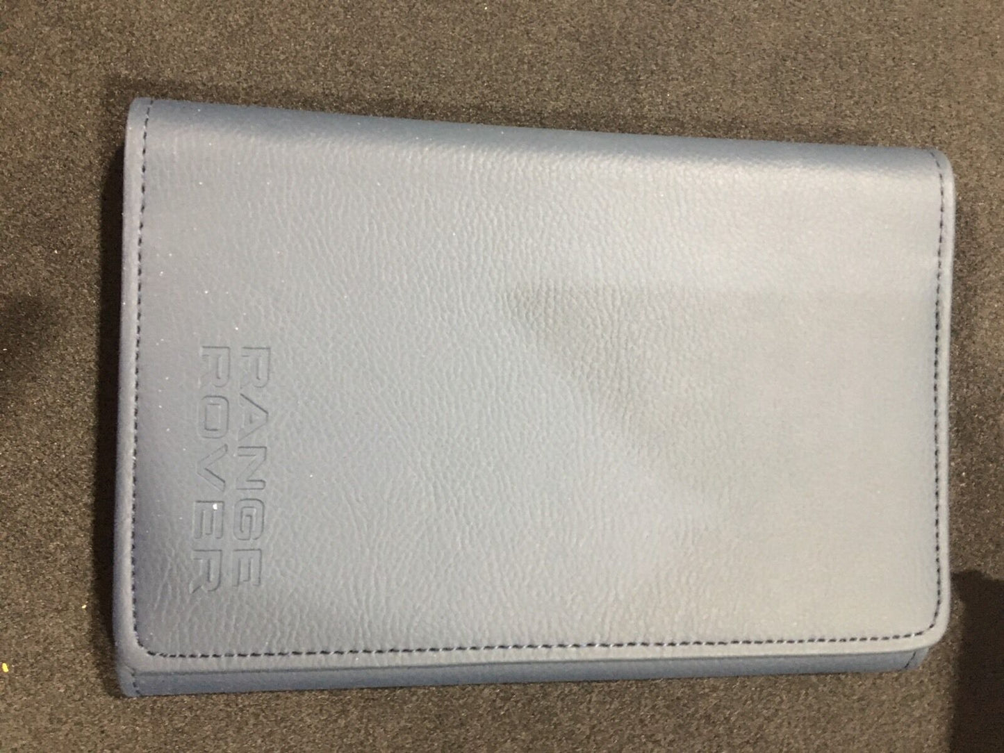 Brand New Range Rover Evoque Owners HandBook And Leather Wallet *spanish*